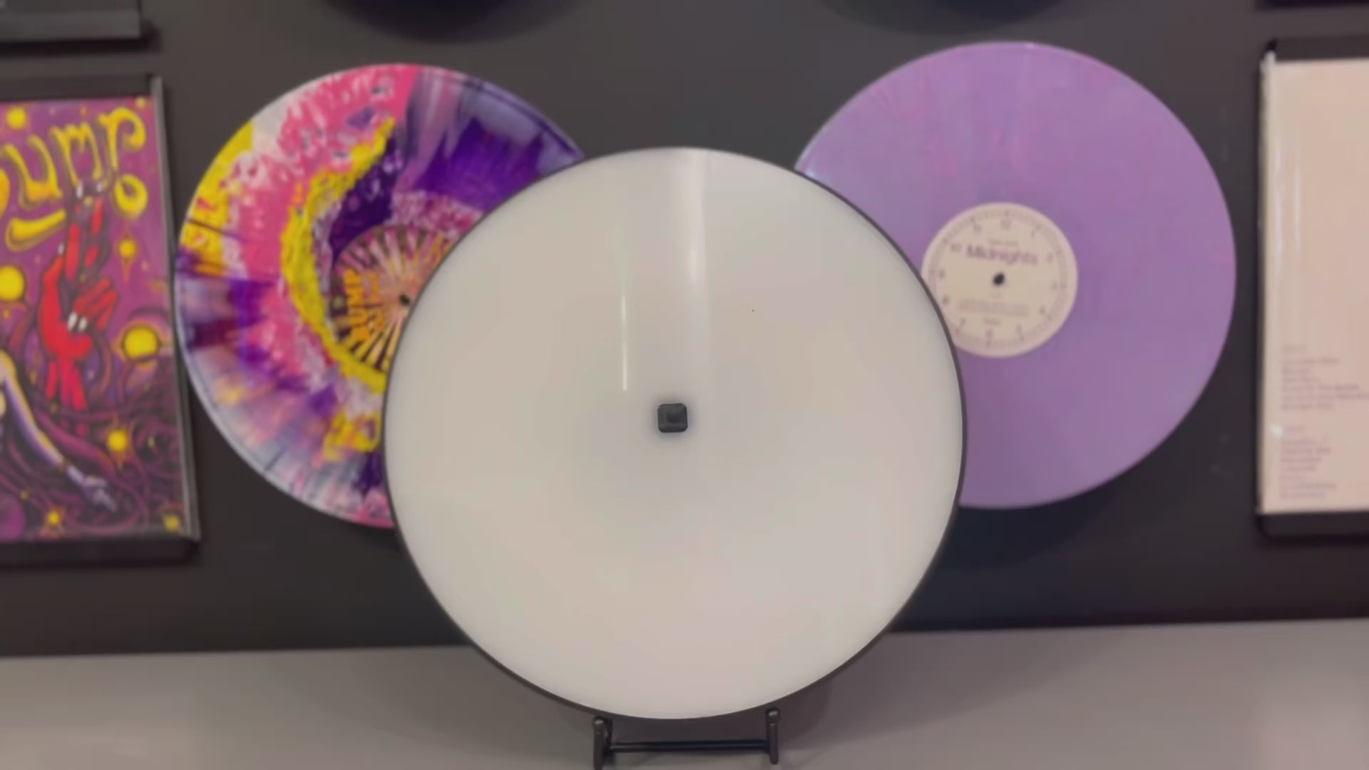 Load video: Putting a colored vinyl record on a light display